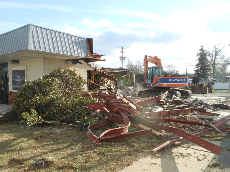 Jimmy's Grille of Rehoboth Beach is expected to open sometime this summer. It will be the third restaurant in the Jimmy's Grill group - adding to the Dewey Beach and Bridgeville locations. The restaurant will be next to Outlet Liquors and behind PNC Bank on Route 1 southbound. This picture taken Jan. 7 shows a pile of mangled steel beams from the building that was demolished to make way for the new restaurant. BY CHRIS FLOOD